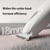A close-up of a white pet paw trimmer with a widened cutter head on a textured surface.