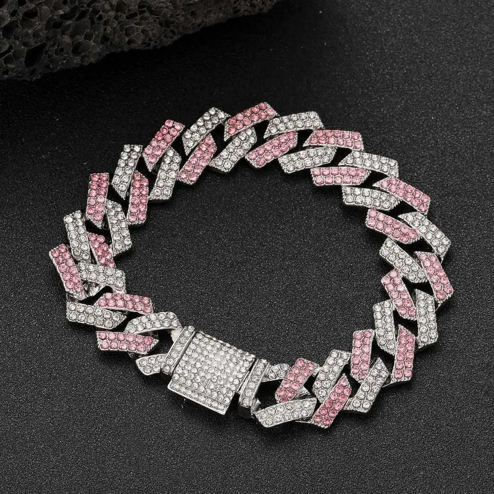 A diamond link pet collar for dogs featuring alternating pink and white diamond-encrusted links.