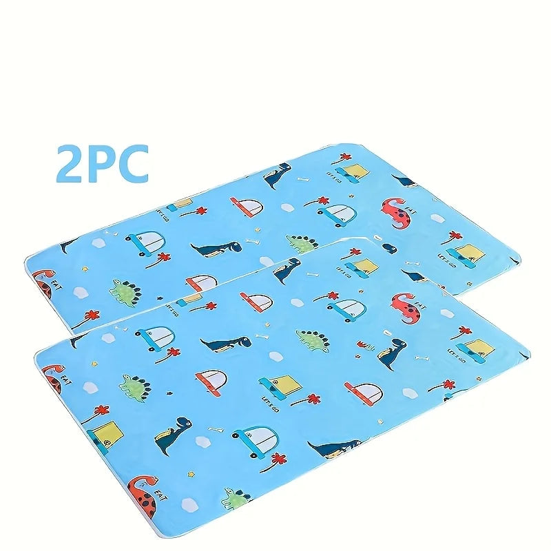 Two blue reusable absorbent pet pee pads featuring various animal and object designs