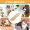 A cat is interacting with an interactive scratcher toy designed for cats.