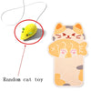 A yellow cat toy is shown being attached to a wall-mounted cat scratcher.