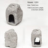 A gray ceramic cichlid cave aquarium decor piece with a natural, rough texture.
