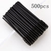 A bundle of 500 disposable black eyelash and eyebrow brushes.