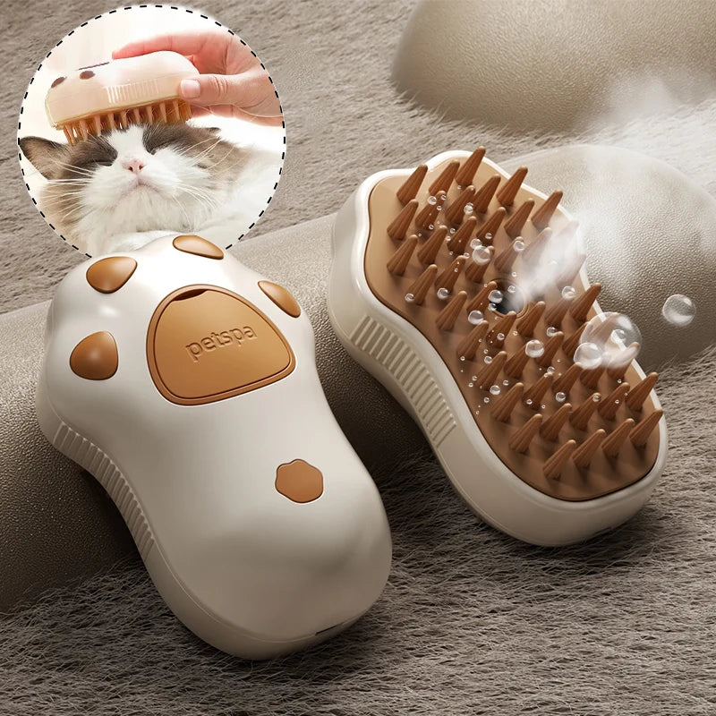 A white electric pet grooming brush with a wooden comb and steam feature is shown next to a cat.
