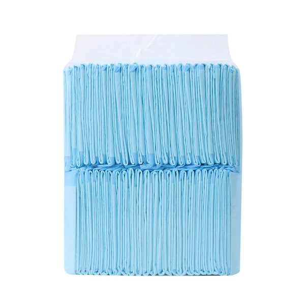 A stack of light blue disposable absorbent dog diapers for training and incontinence.