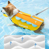 Un perro con chaleco salvavidas amarillo nada en agua azul.