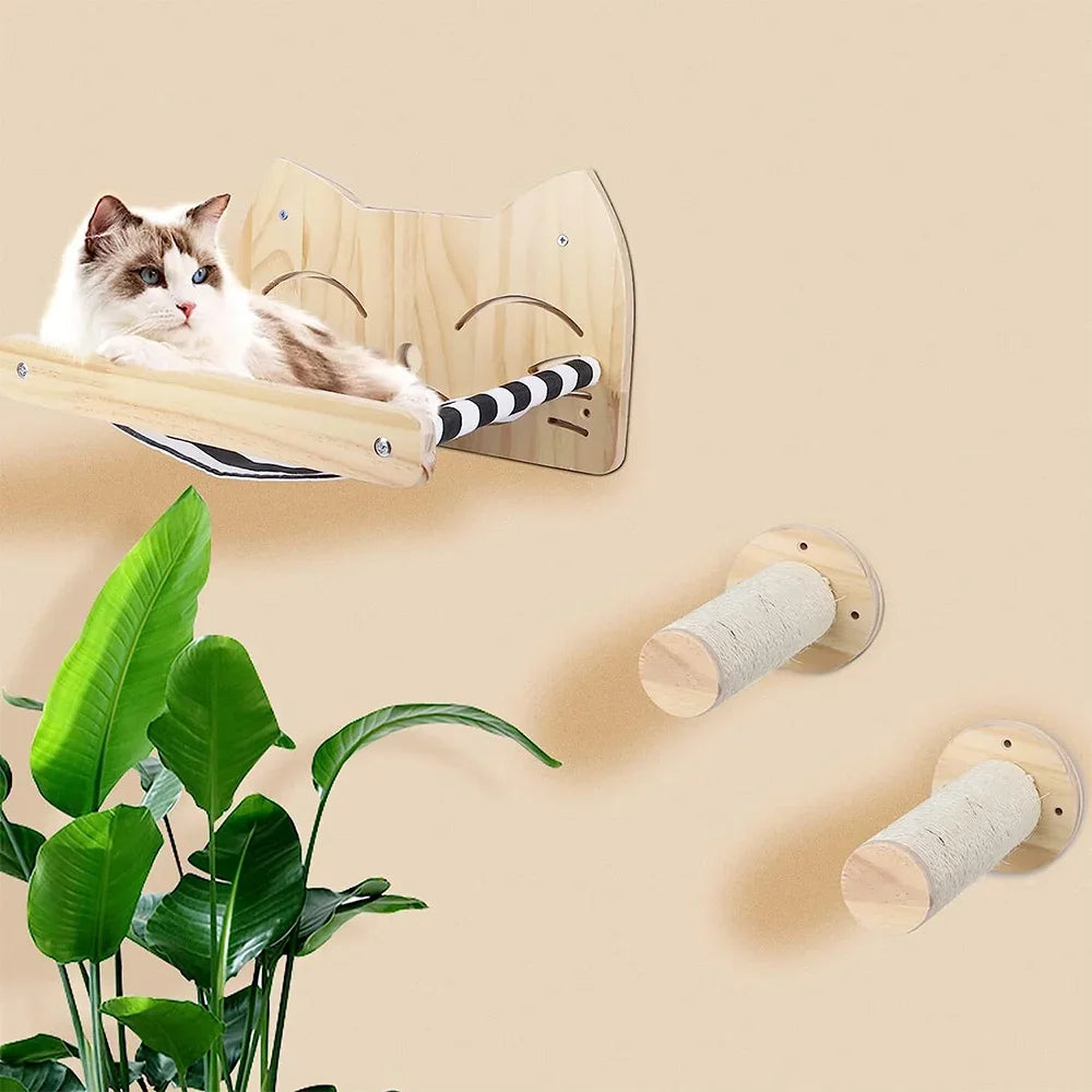 A wooden wall-mounted cat climbing shelf and hammock with a striped fabric is displayed against a light background.