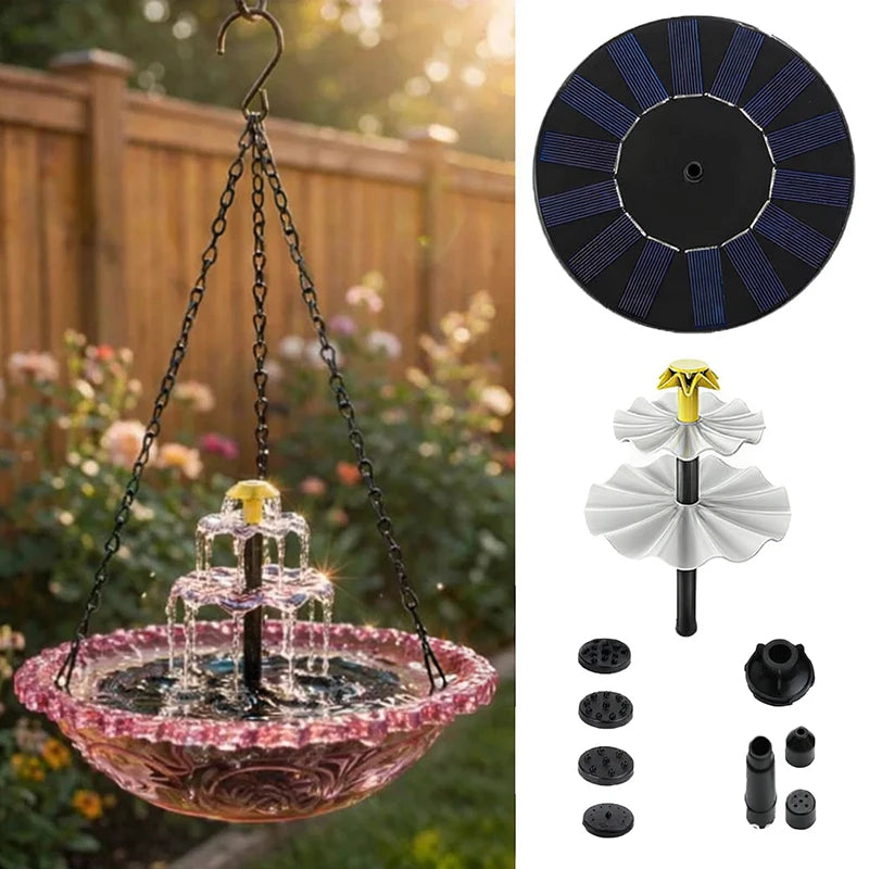 A solar-powered hanging bird bath fountain with a glass bowl and decorative black and blue solar panel.