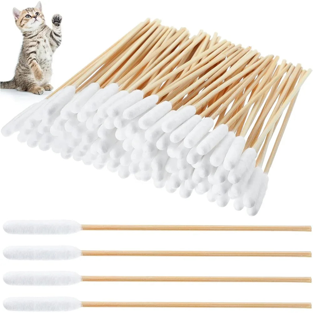 A collection of long cotton swabs for pet ear cleaning, including wooden sticks and white cotton tips.