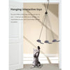 A cat is playing with a hanging interactive toy that features a mouse teaser, shown inside a doorway.
