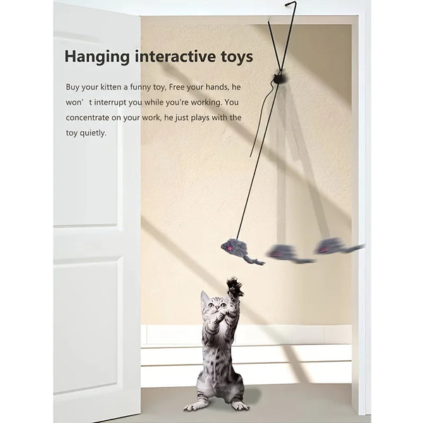 A cat is playing with a hanging interactive toy that features a mouse teaser, shown in a doorway.