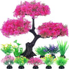 Colección de plantas de acuario artificiales realistas en tonos rosa y verde para decoración del hogar.