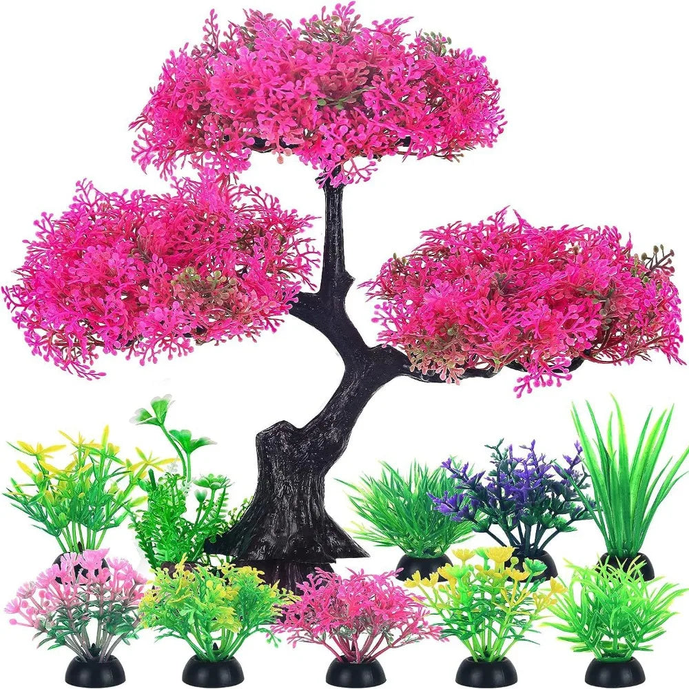 Colección de plantas de acuario artificiales realistas en tonos rosa y verde para decoración del hogar.