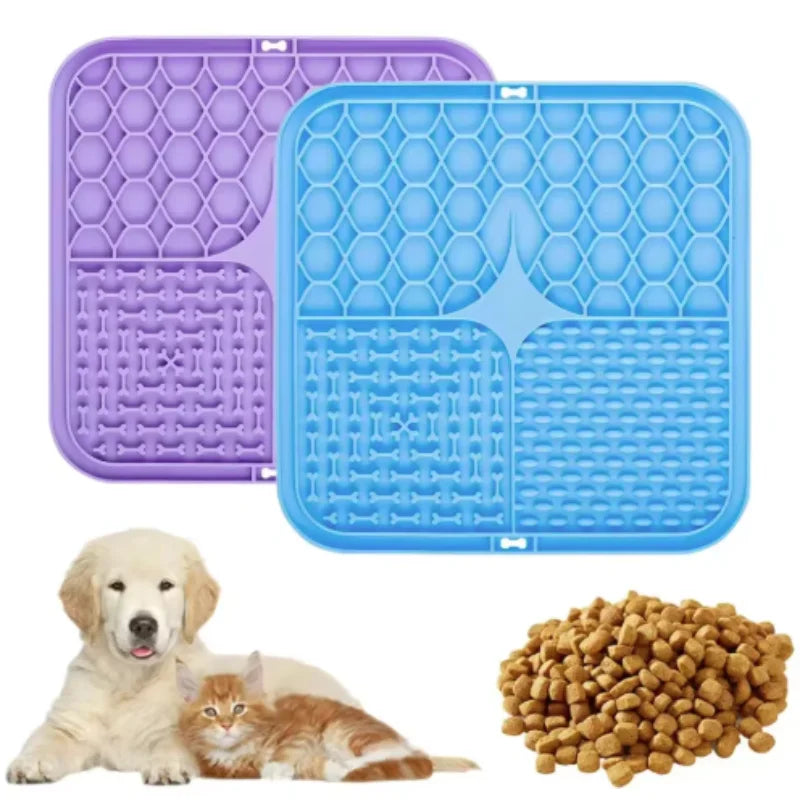 A set of purple and blue silicone lick mats for dog bathing and slow food training, next to a golden retriever and a cat.