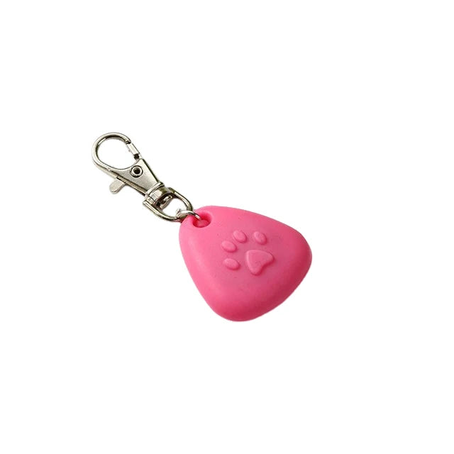 Pink silicone pet collar light with a paw print design and silver clasp.
