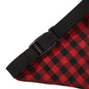 A close-up view of a red and black plaid bandana or scarf for pets.