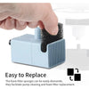 A hand is replacing a black foam filter into a light blue pet water fountain component.