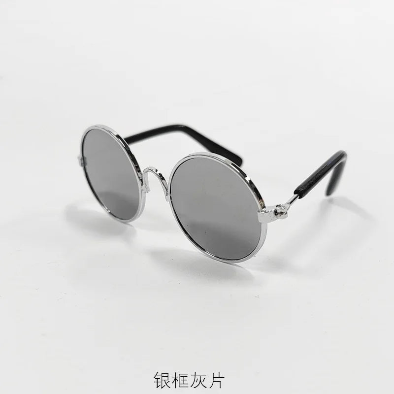 Silver-framed round sunglasses designed for pets