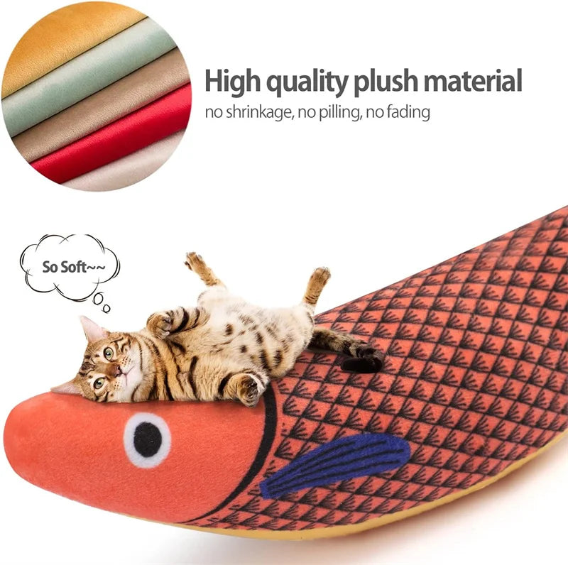 A tabby cat is resting on a orange fish-shaped plush toy with a textured pattern.