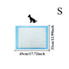 A rectangular blue pet training pad with a silhouette of a dog above it.