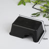 Black reptile and small animal hide box with dimensions 14cm by 6cm and 10cm.