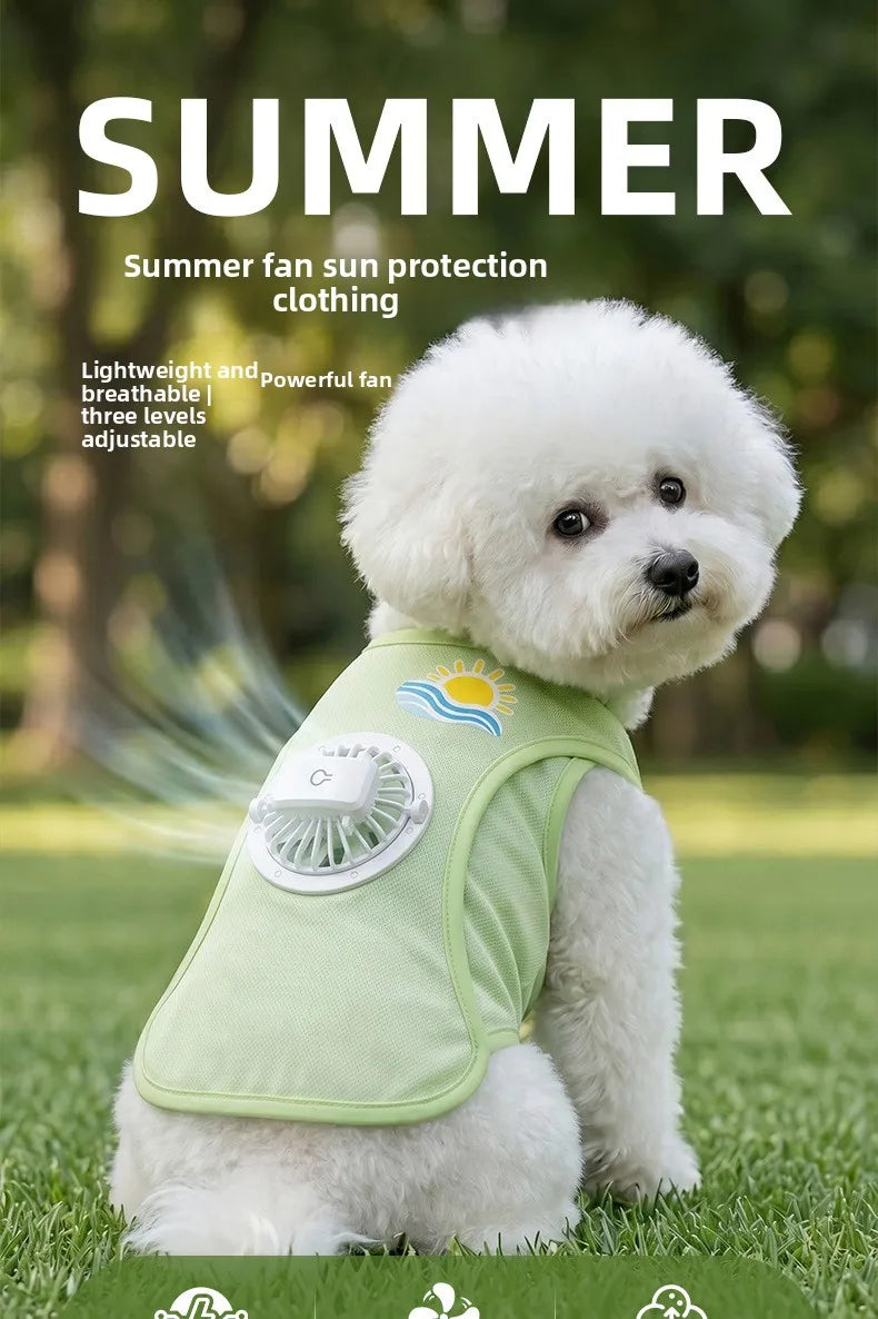A white poodle wearing a light green cooling vest with a built-in fan for summer protection.