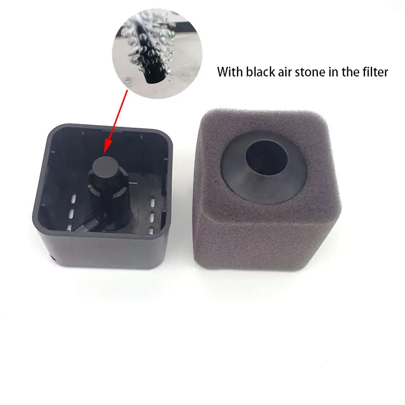 A gray sponge filter housing with a black air stone visible through the filter.