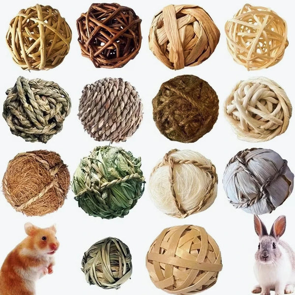 A collection of natural grass chew balls and a small rabbit pet.