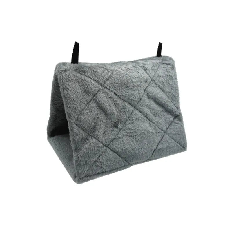 A gray cozy plush bird hammock tent with quilted texture and black hanging cords.