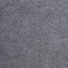 A close-up view of a gray self-adhesive cat scratching mat textured with vertical ridges.