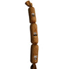 A string of brown, stuffed dog chew toys shaped like faces for puppies and adults