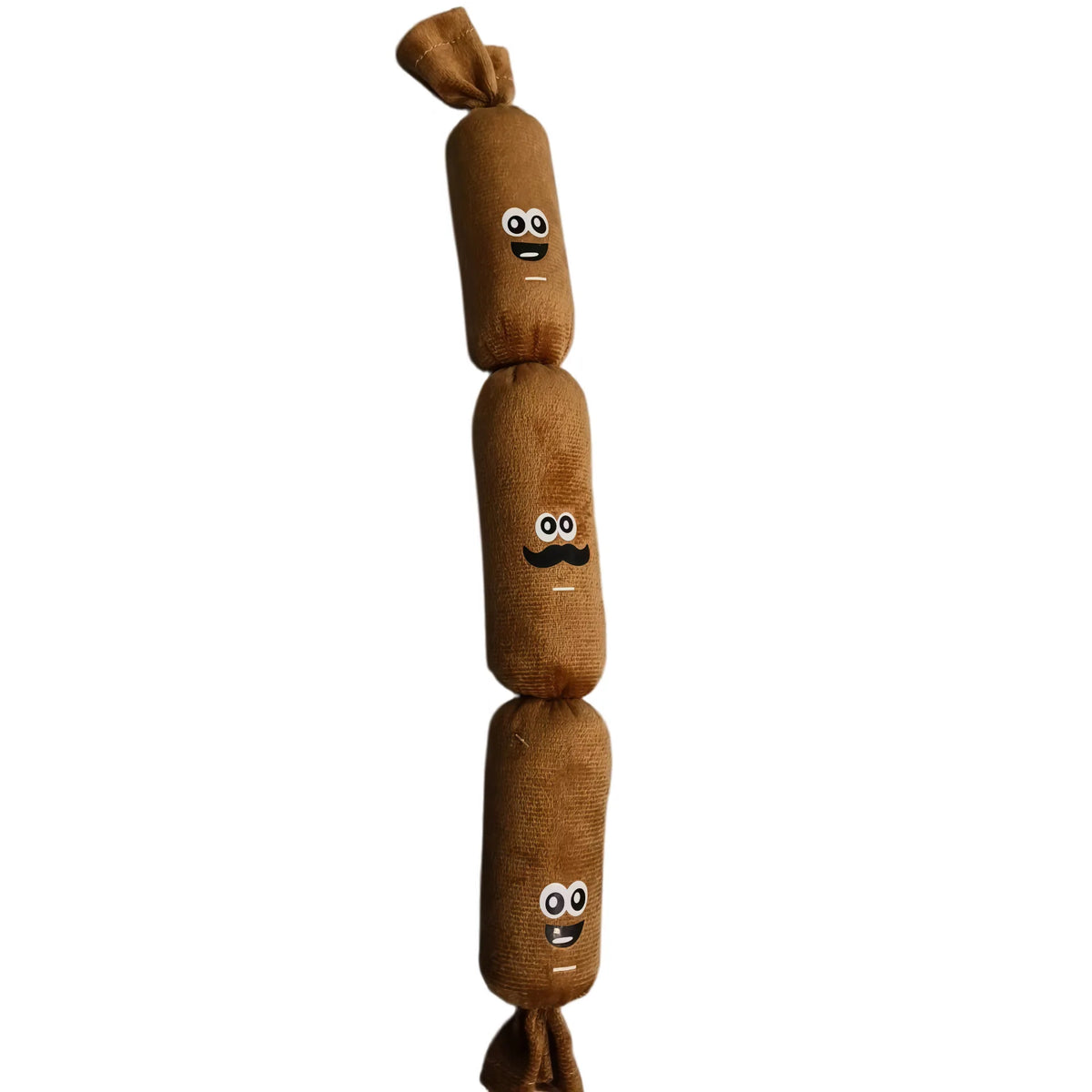 A string of brown, stuffed dog chew toys shaped like faces for puppies and adults