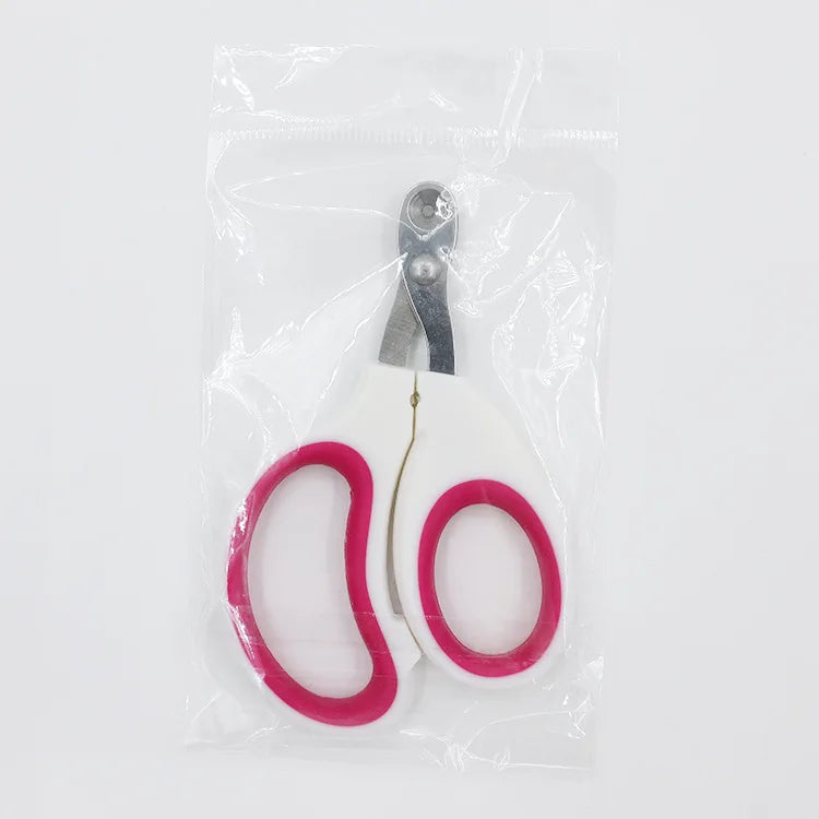 Edelstahl-Krallennipper für Katzen mit rosa Griffen, verpackt in einer klaren Plastiktüte