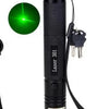 A black portable laser indicator light with a green beam visible.