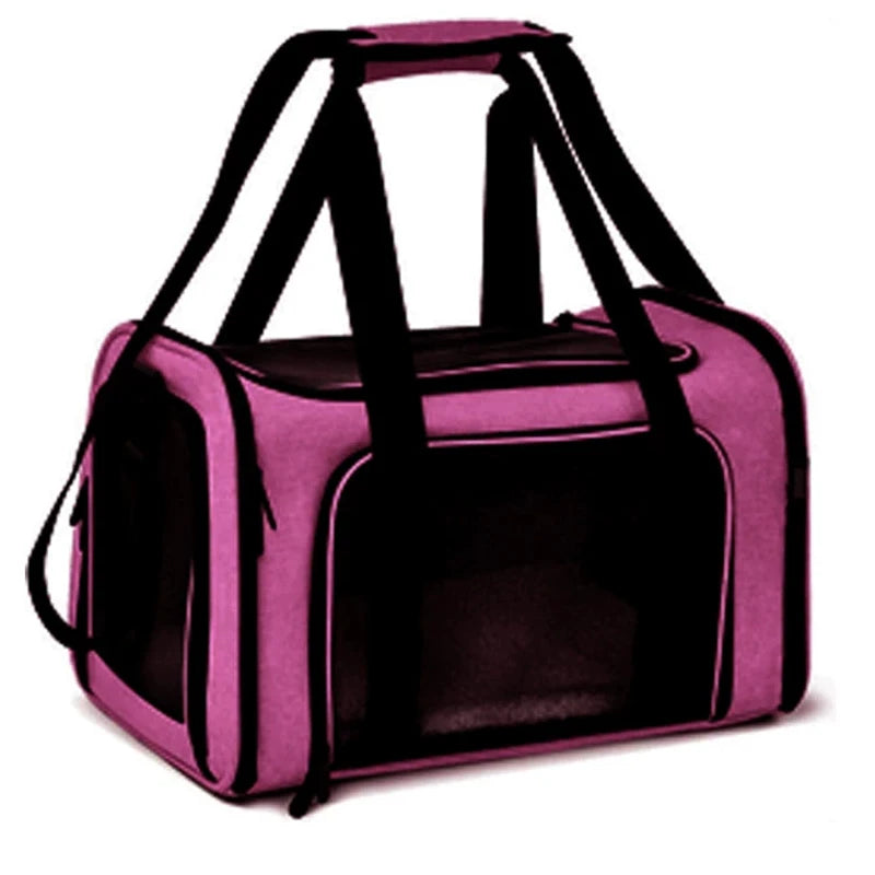 A purple portable pet carrier bag with black straps and a rectangular opening.