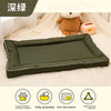 A dark olive green pet mat with a padded edge and anti-slip bottom is shown on a white fluffy surface.