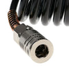 A close-up view of a black heavy-duty air compressor hose with a copper threaded fitting and a quick coupler adapter.