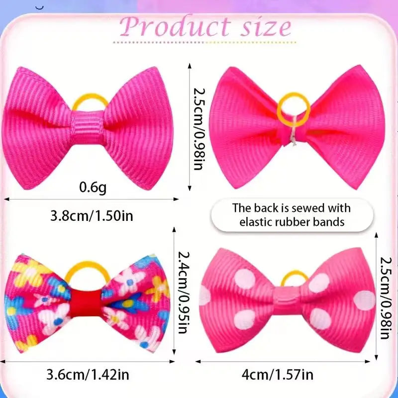 A display of various pink and multi-colored handmade dog bows with elastic rubber bands shown in different sizes.
