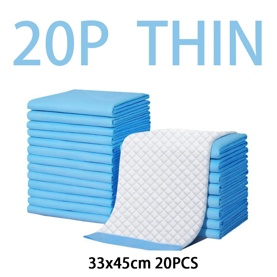 A stack of 20 thin blue disposable absorbent dog diapers, measuring 33x45cm, is shown.