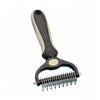 A black and beige pet detangler comb and grooming brush with a curved handle and metal teeth.