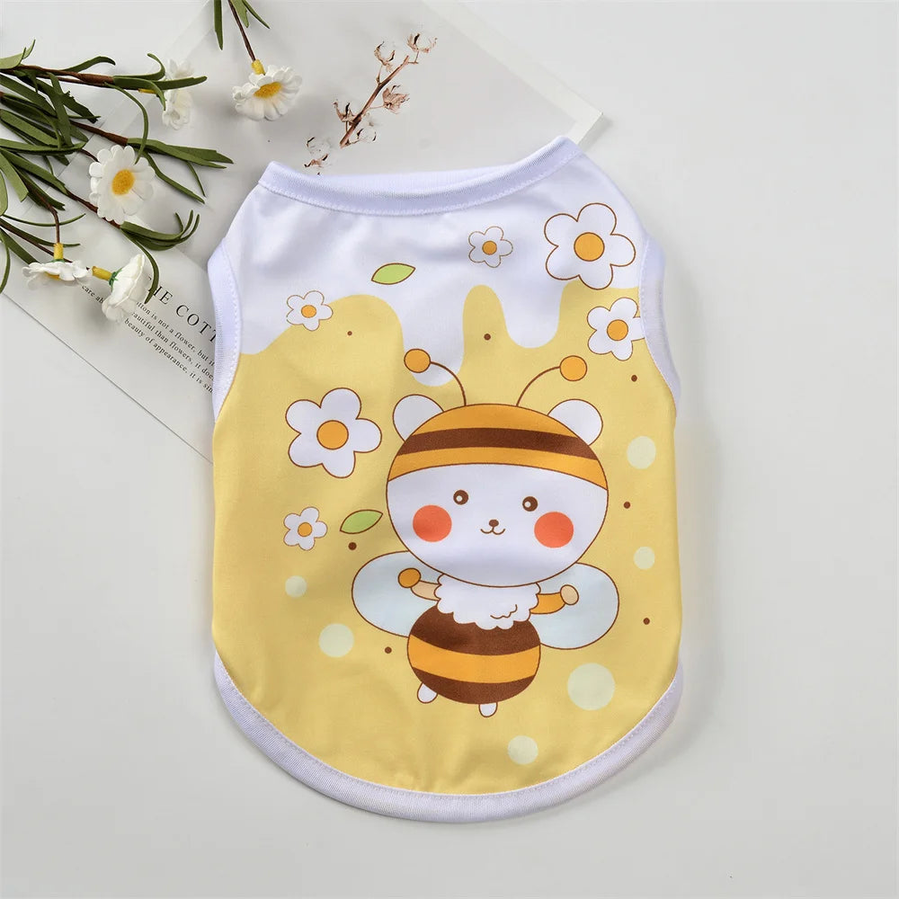 A yellow sleeveless vest featuring a cute bee design with white and orange accents for small pets.