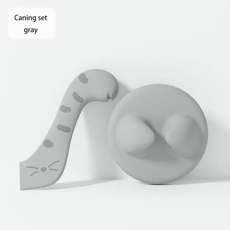 A gray silicone pet can opener and feeding spoon with a sealing lid.