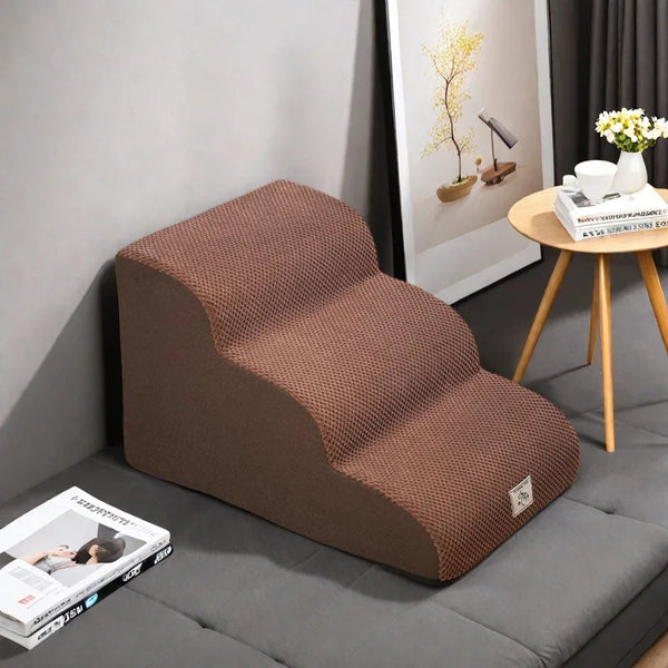Brown washable non-slip pet stairs designed for use with a bed or sofa.