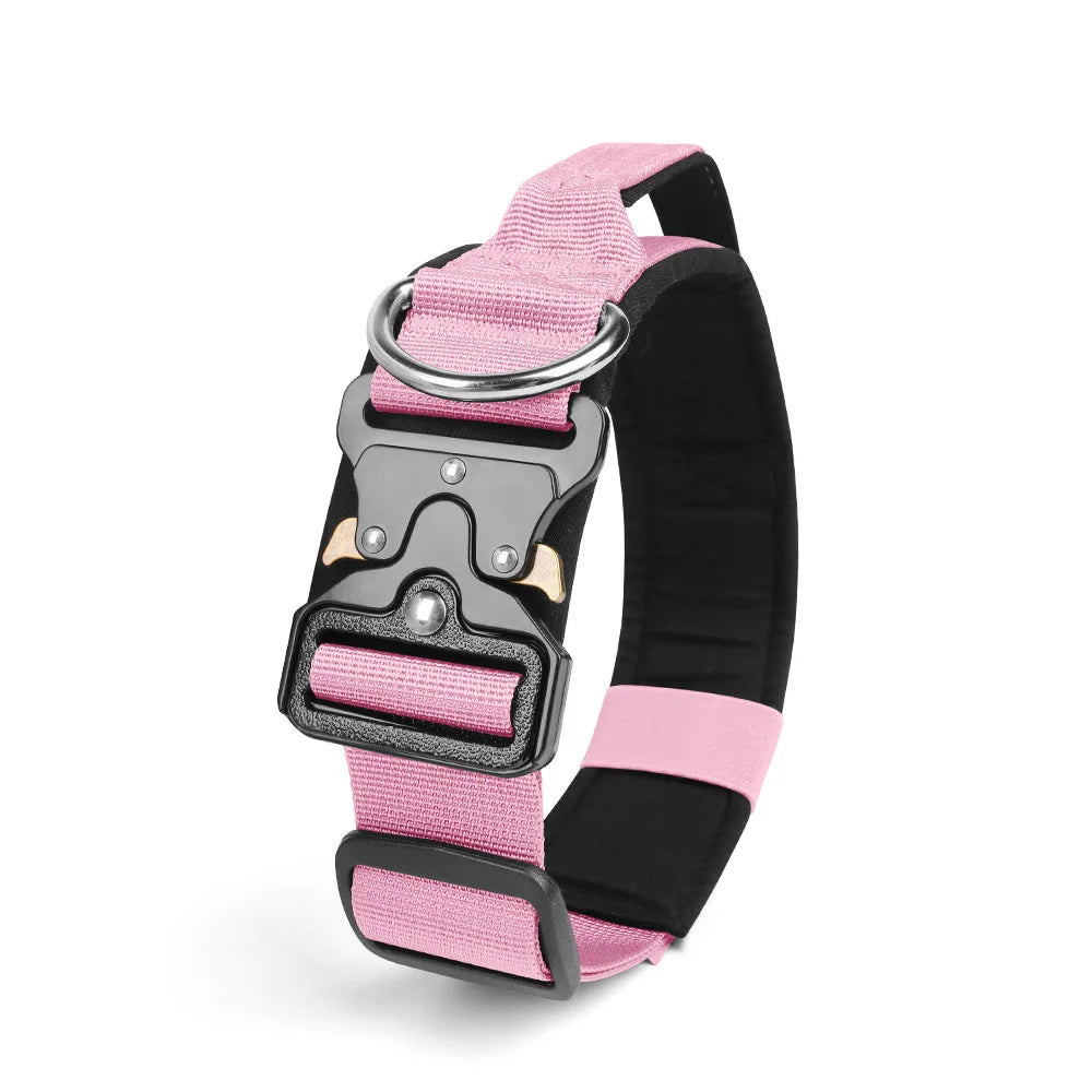 A pink and black durable tactical dog collar with a silver buckle and padded strap.