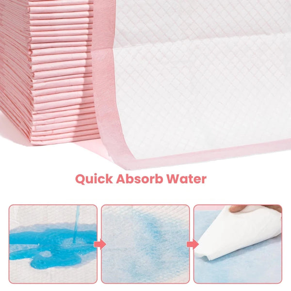 Pink super absorbent dog pee pads demonstrating quick water absorption and leak-proof protection.