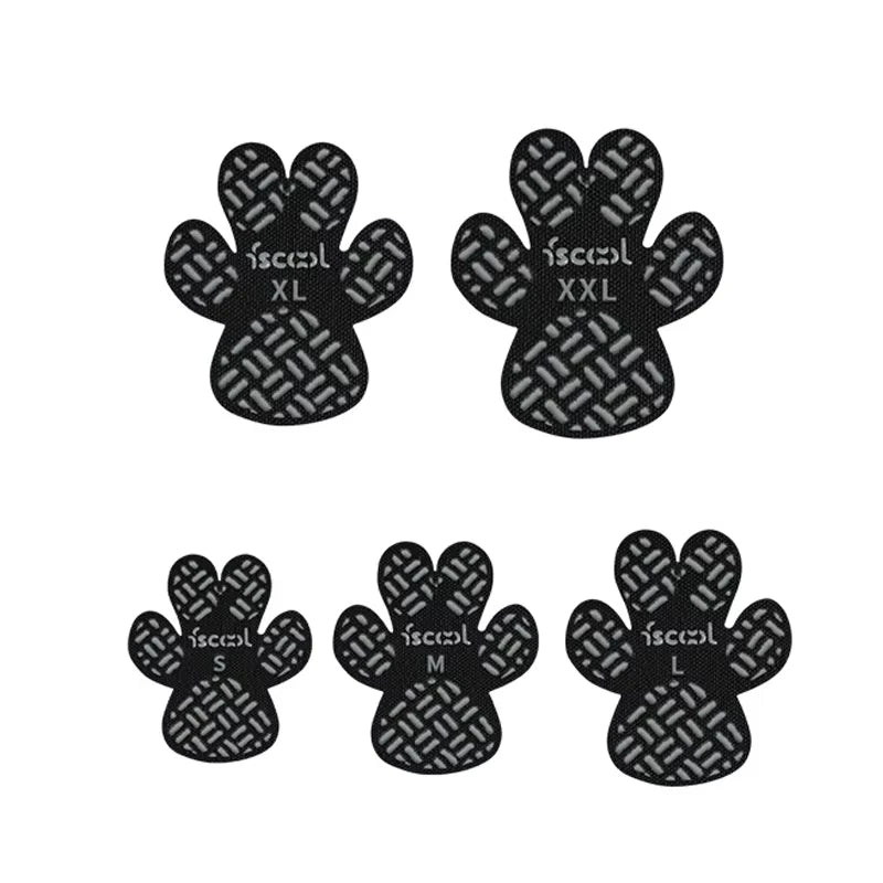 A pack of four dog anti-slip paw grips in various sizes, including XS, S, M, and L.