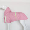 A pink waterproof reflective dog raincoat is displayed on a white mannequin.