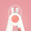 A close-up view of a white pet nail clipper with a pink light and silver metal components against a pink background.