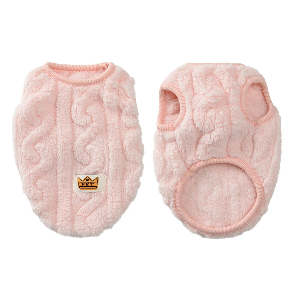 A pair of pink fuzzy fleece dog sweaters for small and medium breeds.