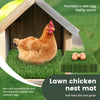 A brown hen sits in a wooden nesting box lined with green grass, demonstrating the use of a lawn chicken nest mat.